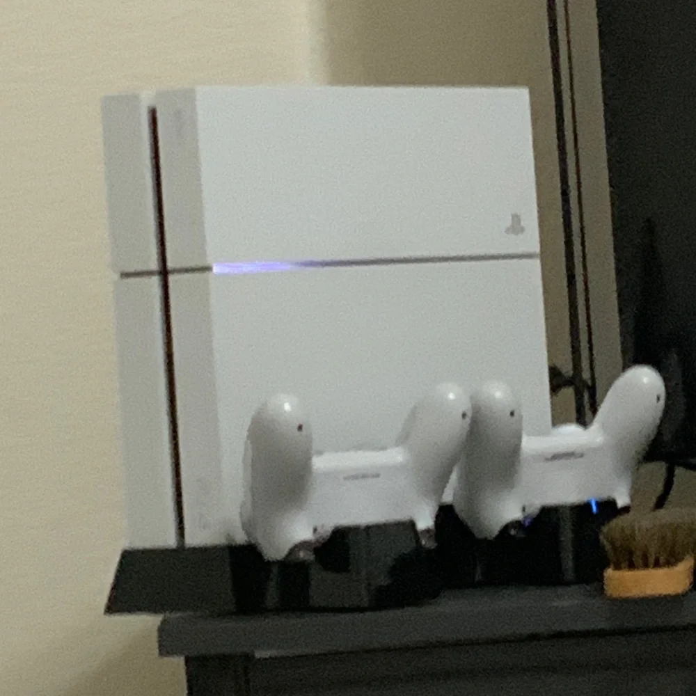Sony White PS4 Console with Controllers